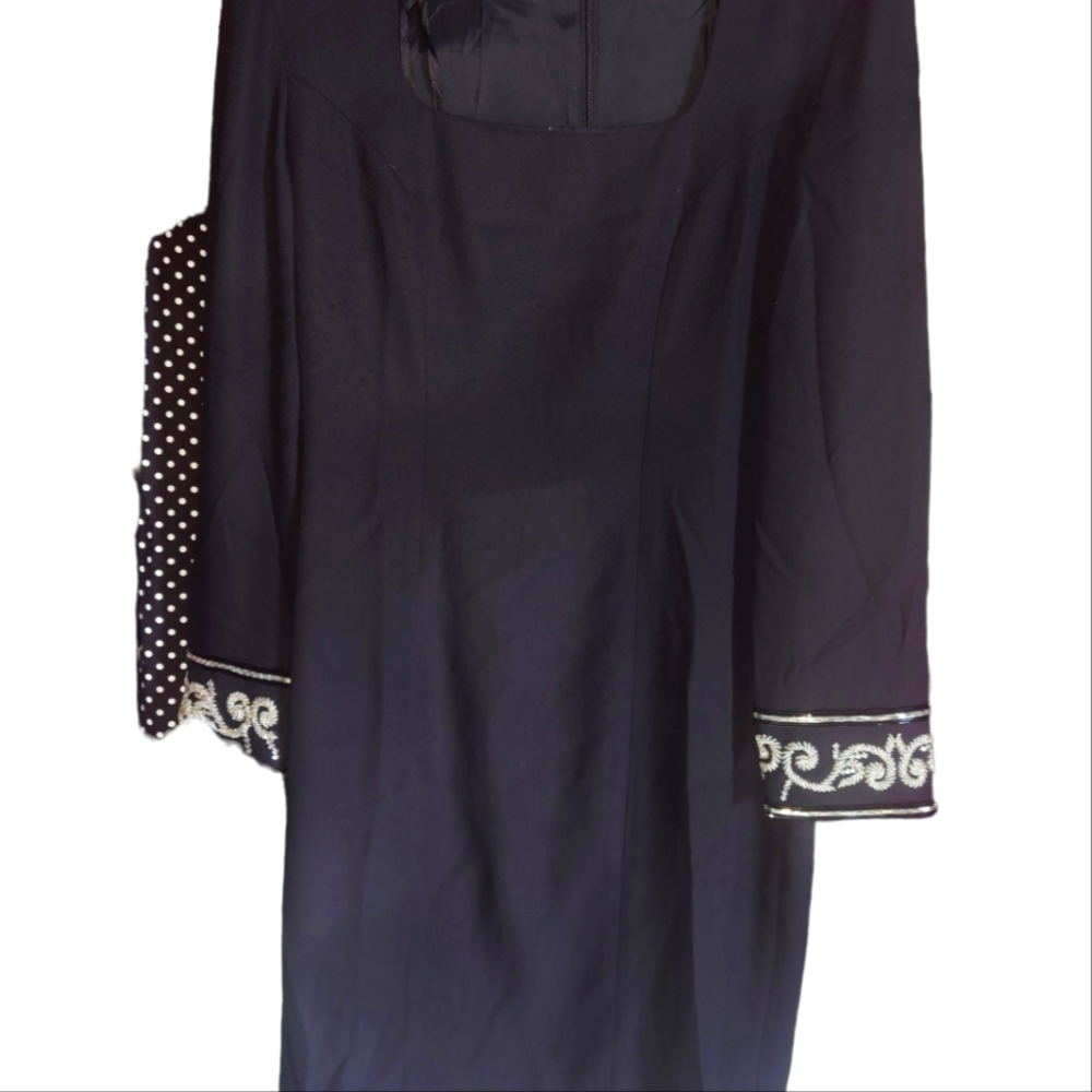 Liz Claiborne classic long sleeve black dress with beaded cuffs.